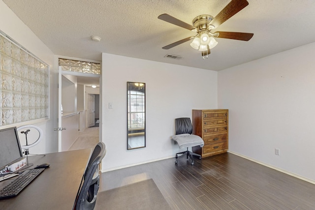 8202 Silverton Dr, Arlington, TX 76001 - office space with ceiling fan, a textured ceiling, visible vents, wood finished floors, and baseboards