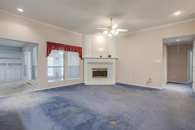 unfurnished living room with attic access, ceiling fan, baseboards, and crown molding