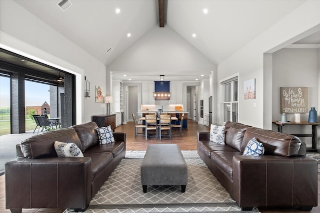 living area with recessed lighting, beam ceiling, high vaulted ceiling, visible vents, and wood finished floors