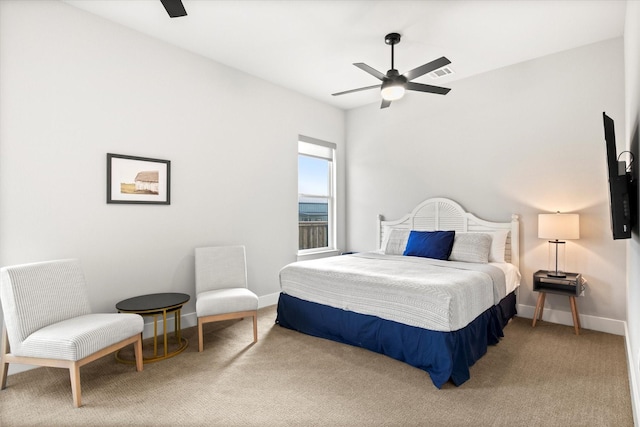 bedroom featuring visible vents, ceiling fan, carpet flooring, and baseboards