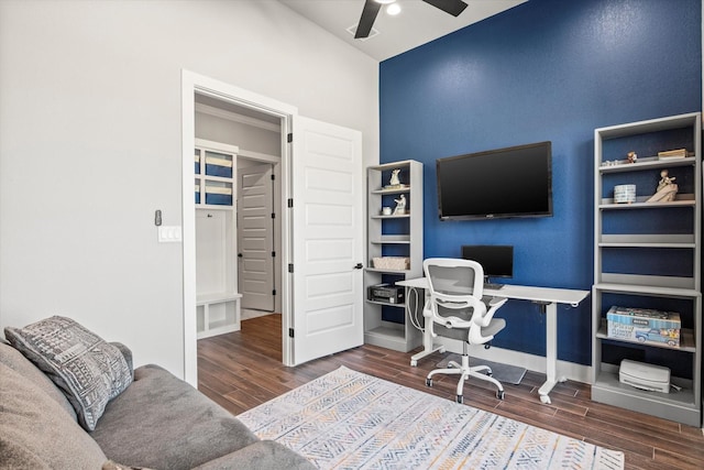 office space featuring ceiling fan, wood finished floors, and baseboards