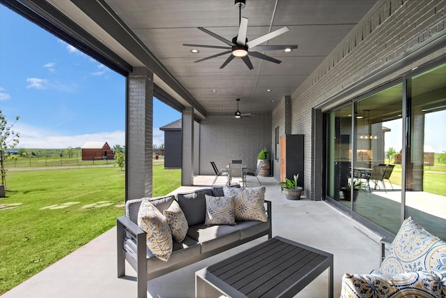 view of patio featuring an outdoor living space and ceiling fan