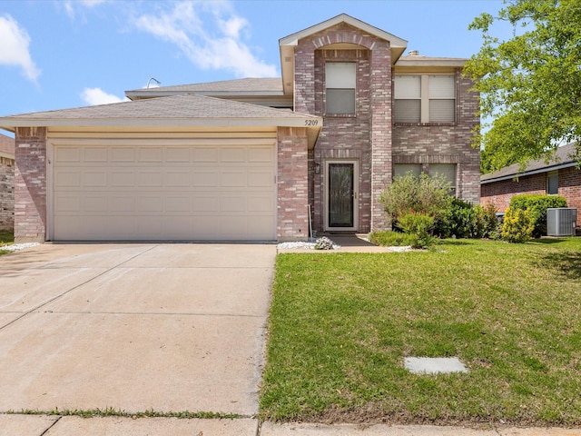 traditional-style home featuring central AC, a front yard, brick siding, an attached garage, and driveway