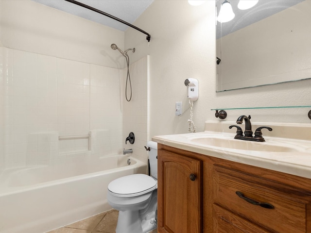 bathroom featuring toilet, tile patterned floors, vanity, and  shower combination