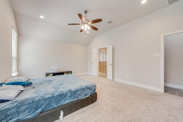 bedroom with lofted ceiling, carpet flooring, visible vents, and baseboards
