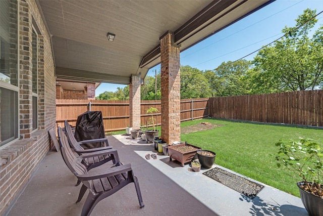 view of patio with a fenced backyard