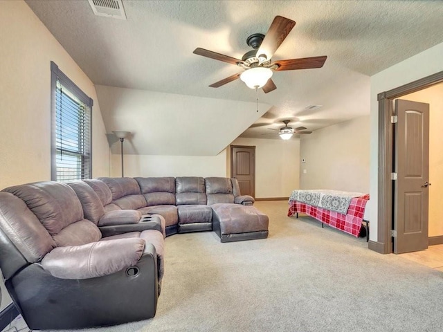 194 Royal Pnes, Lufkin, TX 75904 - living room featuring ceiling fan, a textured ceiling, carpet flooring, and baseboards