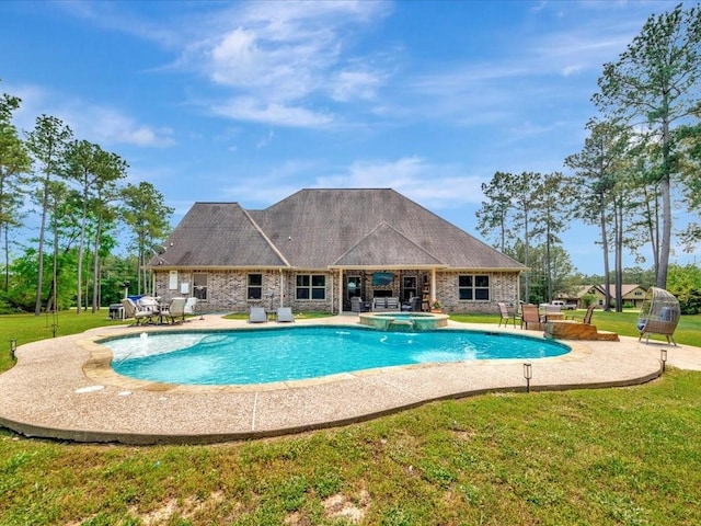 194 Royal Pnes, Lufkin, TX 75904 - view of pool featuring a yard, a patio, and a pool with connected hot tub