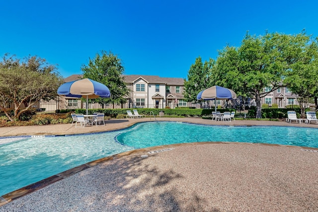 6948 Carrington Ln, Fort Worth, TX 76137 - community pool featuring a patio area and fence