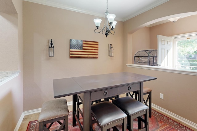 6948 Carrington Ln, Fort Worth, TX 76137 - dining space with baseboards, light wood-type flooring, arched walkways, and a chandelier