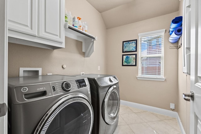 4304 Caney Creek Cir, Celina, TX 75078 - clothes washing area featuring light tile patterned floors, cabinet space, baseboards, and washer and clothes dryer