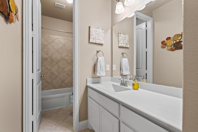4304 Caney Creek Cir, Celina, TX 75078 - bathroom with tile patterned flooring, toilet, vanity, visible vents, and tub / shower combination