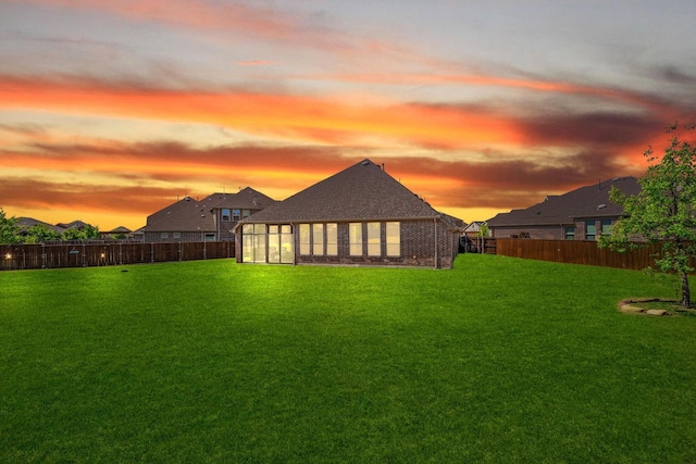 4304 Caney Creek Cir, Celina, TX 75078 - rear view of house with a lawn and a fenced backyard
