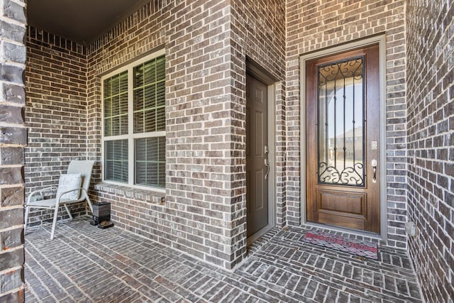 4304 Caney Creek Cir, Celina, TX 75078 - view of exterior entry with brick siding
