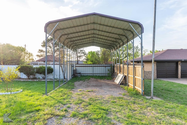 view of vehicle parking featuring a carport and fence