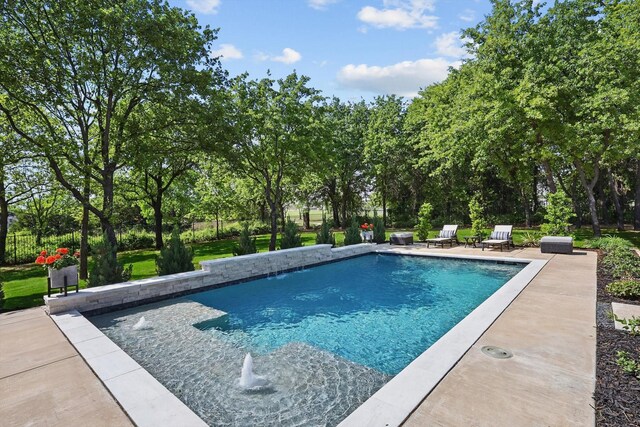 pool featuring a patio area