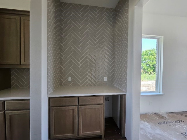 213 Pilot Dr, Caddo Mills, TX 75135 - kitchen with decorative backsplash and light countertops