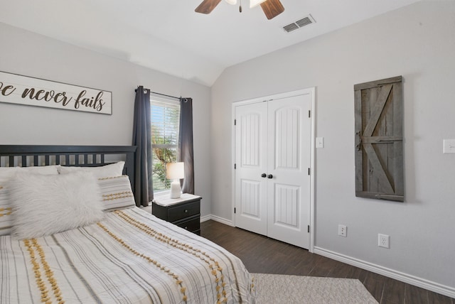 202 Hill Valley Dr, Stephenville, TX 76401 - bedroom with a closet, baseboards, visible vents, dark wood-type flooring, and lofted ceiling