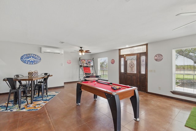 202 Hill Valley Dr, Stephenville, TX 76401 - game room featuring a ceiling fan, an AC wall unit, billiards, and a wealth of natural light
