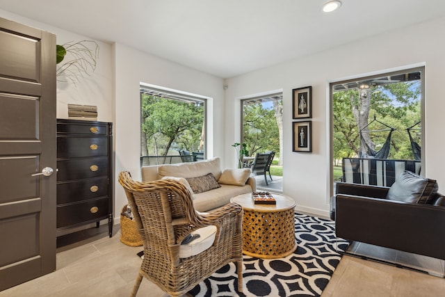 7342 Briar Rd, Azle, TX 76020 - living room featuring baseboards, recessed lighting, light tile patterned flooring, and a healthy amount of sunlight