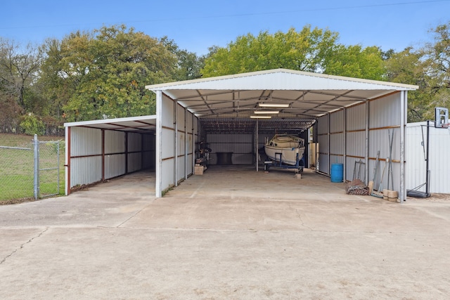 7342 Briar Rd, Azle, TX 76020 - view of parking with concrete driveway, a carport, and fence