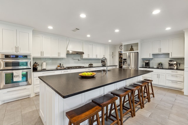 7342 Briar Rd, Azle, TX 76020 - kitchen featuring stainless steel appliances, premium range hood, a sink, and dark countertops