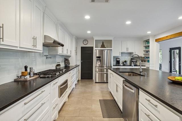 7342 Briar Rd, Azle, TX 76020 - kitchen featuring a warming drawer, open shelves, dark countertops, stainless steel appliances, and a sink