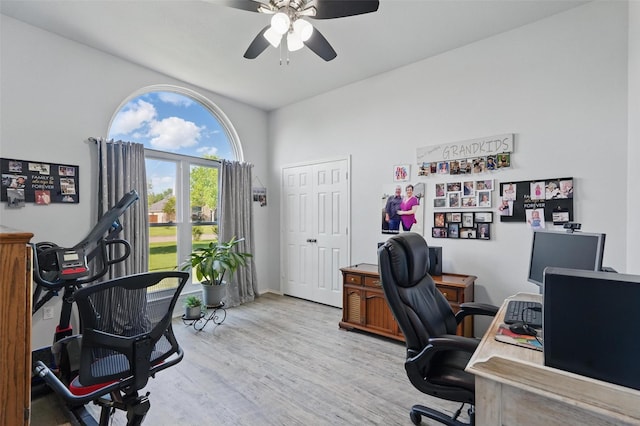 office area with wood finished floors and a ceiling fan