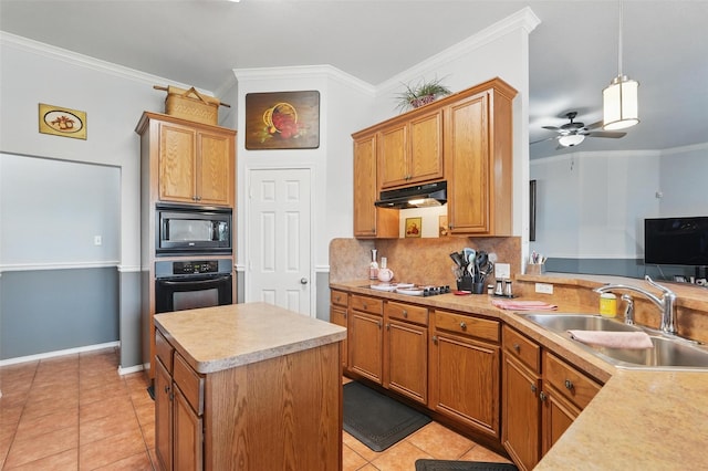 kitchen with light tile patterned floors, tasteful backsplash, black appliances, under cabinet range hood, and a sink