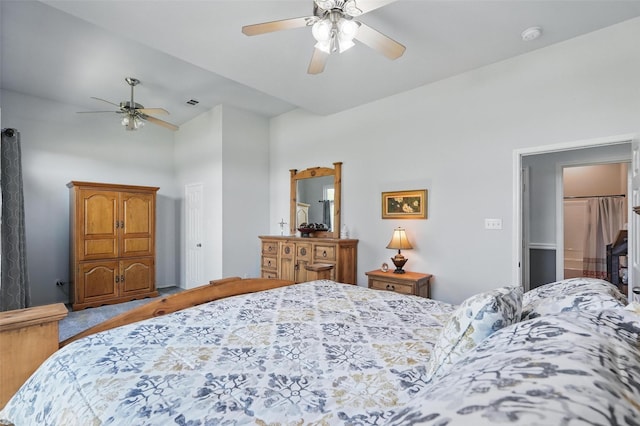 bedroom with high vaulted ceiling, visible vents, and a ceiling fan