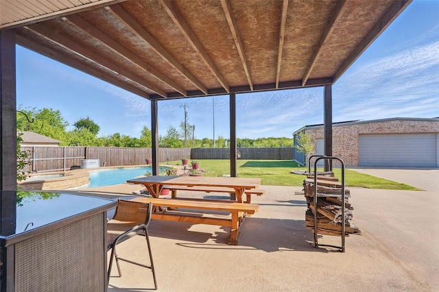 view of patio with a fenced in pool, a fenced backyard, and an outbuilding