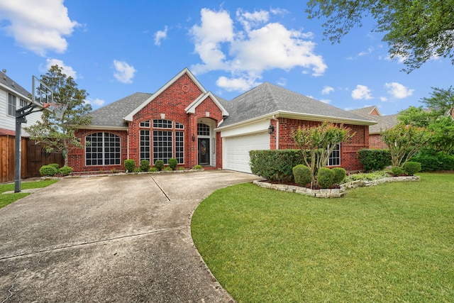 3419 Willowcreek Dr, Sunnyvale, TX 75182 - ranch-style home with roof with shingles, fence, brick siding, a front lawn, and a garage