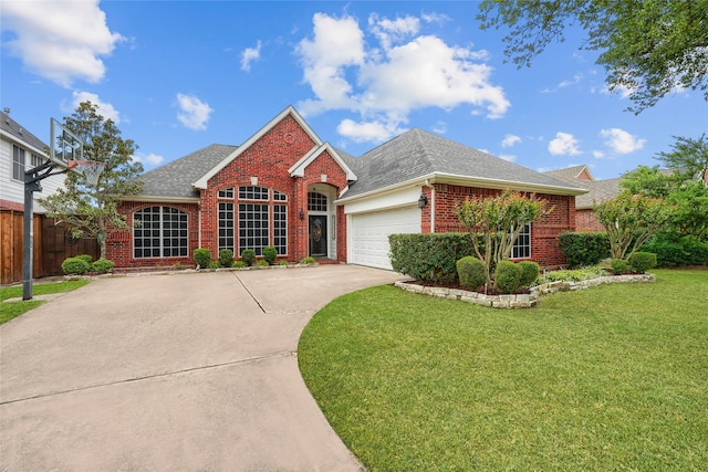 3419 Willowcreek Dr, Sunnyvale, TX 75182 - view of front facade with brick siding, roof with shingles, an attached garage, and concrete driveway