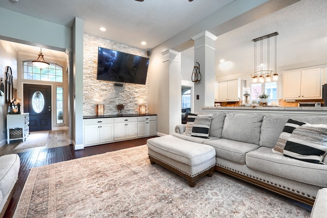 3419 Willowcreek Dr, Sunnyvale, TX 75182 - living room featuring wood finished floors, a textured ceiling, and recessed lighting