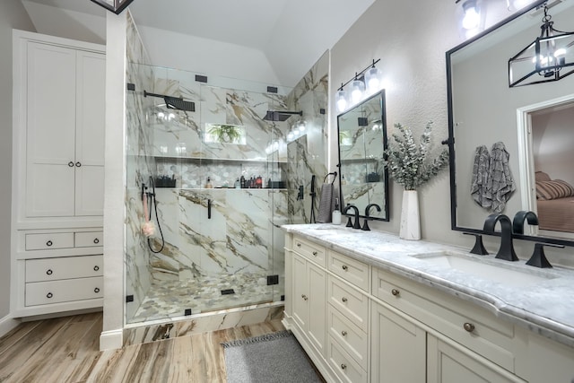 3419 Willowcreek Dr, Sunnyvale, TX 75182 - full bathroom featuring lofted ceiling, wood finished floors, a marble finish shower, and a sink