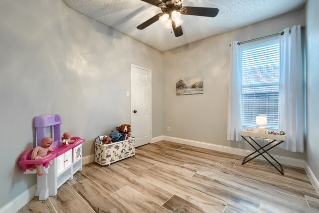3419 Willowcreek Dr, Sunnyvale, TX 75182 - interior space with baseboards, wood finished floors, and ceiling fan