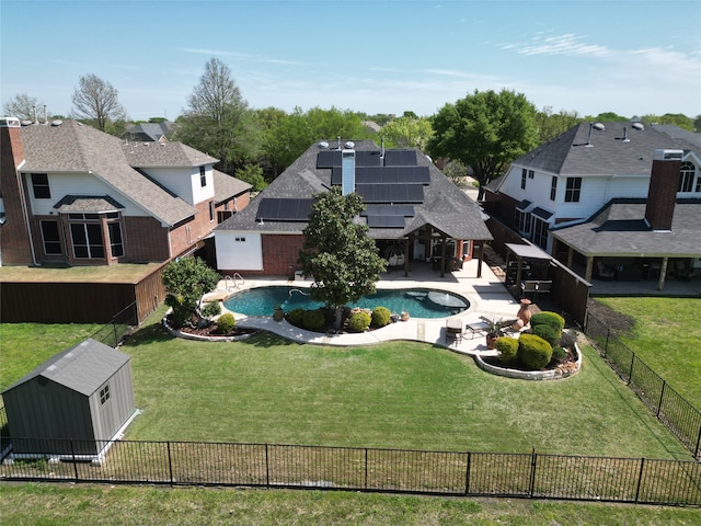 3419 Willowcreek Dr, Sunnyvale, TX 75182 - view of swimming pool with a storage unit, an outbuilding, a fenced backyard, a yard, and a patio