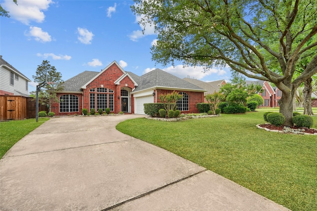 3419 Willowcreek Dr, Sunnyvale, TX 75182 - view of front of home featuring brick siding, a garage, concrete driveway, and a shingled roof