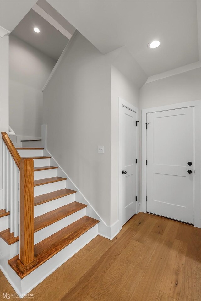 916 Aaron Ln, Benton, LA 71006 - staircase with wood finished floors and recessed lighting