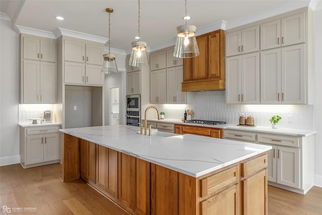 916 Aaron Ln, Benton, LA 71006 - kitchen featuring light wood-type flooring, stainless steel appliances, tasteful backsplash, recessed lighting, and crown molding