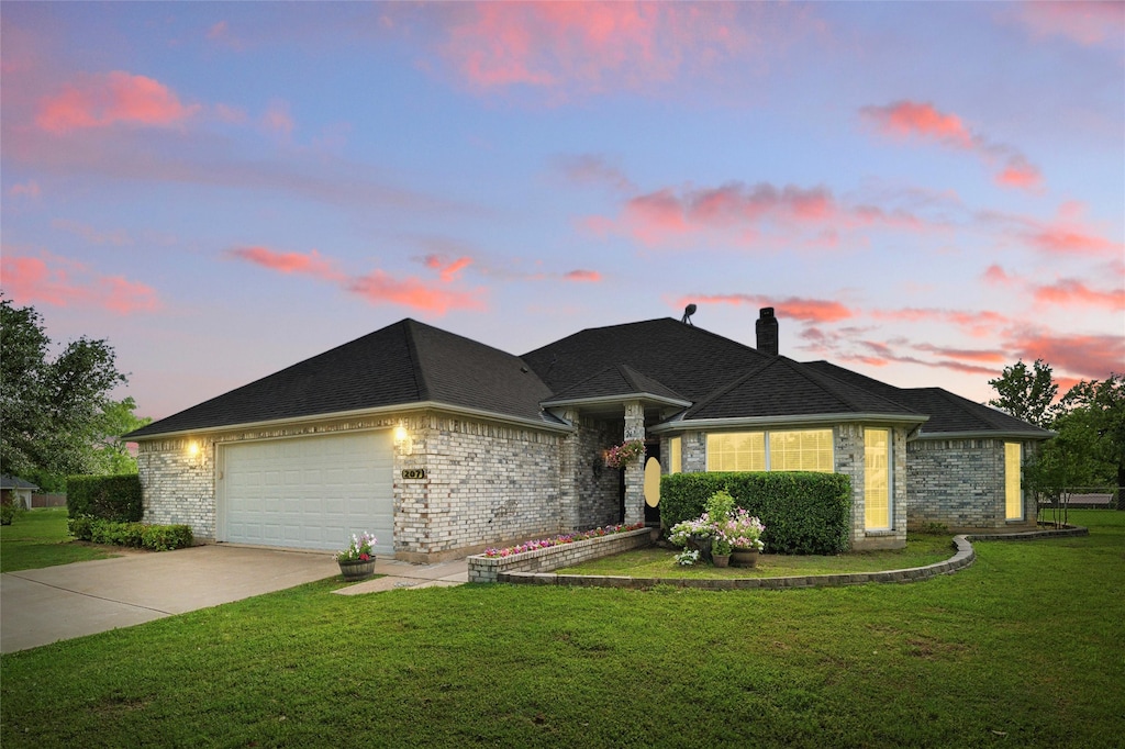 207 Willow Creek Ct, Mansfield, TX 76063 - single story home featuring a chimney, a yard, brick siding, concrete driveway, and an attached garage