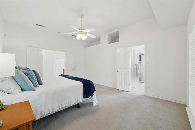 carpeted bedroom featuring a ceiling fan, baseboards, and visible vents