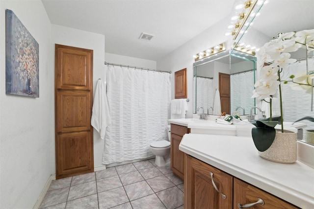 full bath with visible vents, tile patterned flooring, vanity, toilet, and baseboards