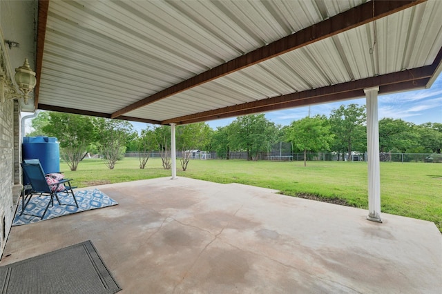 view of patio with a fenced backyard and a trampoline