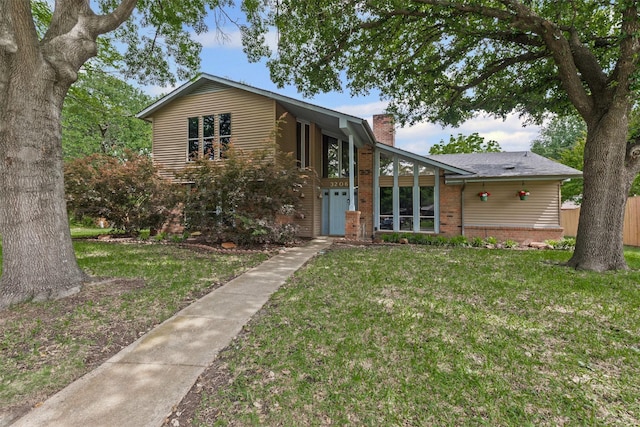 3206 Knights Haven Ln, Garland, TX 75044 - mid-century modern home with a chimney and brick siding