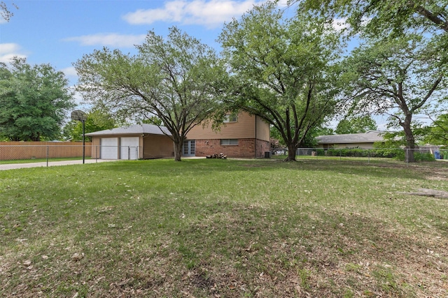 3206 Knights Haven Ln, Garland, TX 75044 - view of yard with a garage and concrete driveway