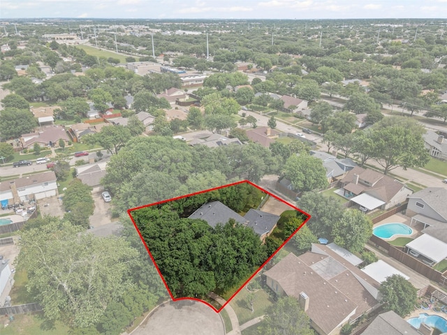 3206 Knights Haven Ln, Garland, TX 75044 - aerial perspective of suburban area with property parcel outlined and a pool