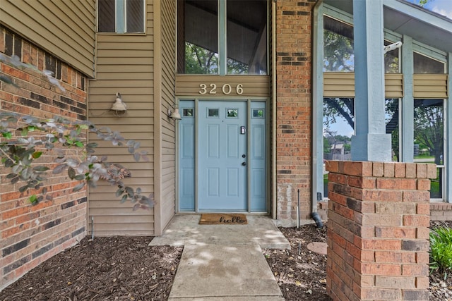 3206 Knights Haven Ln, Garland, TX 75044 - doorway to property featuring brick siding