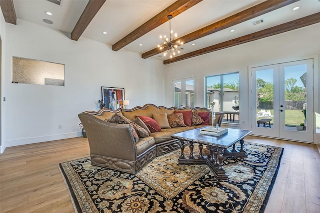 living room featuring beamed ceiling, visible vents, french doors, and light wood-type flooring