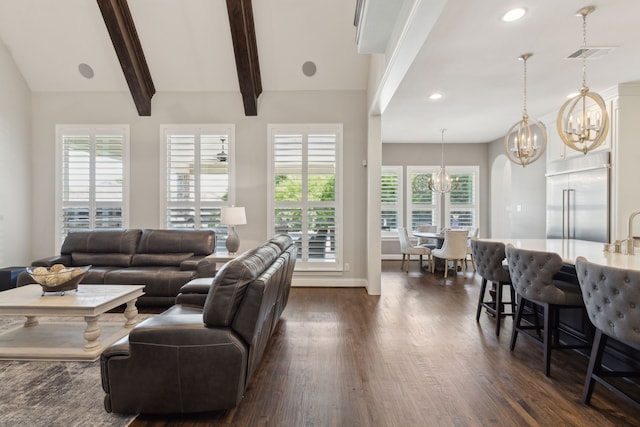 living area featuring dark wood-style floors, visible vents, baseboards, recessed lighting, and a notable chandelier